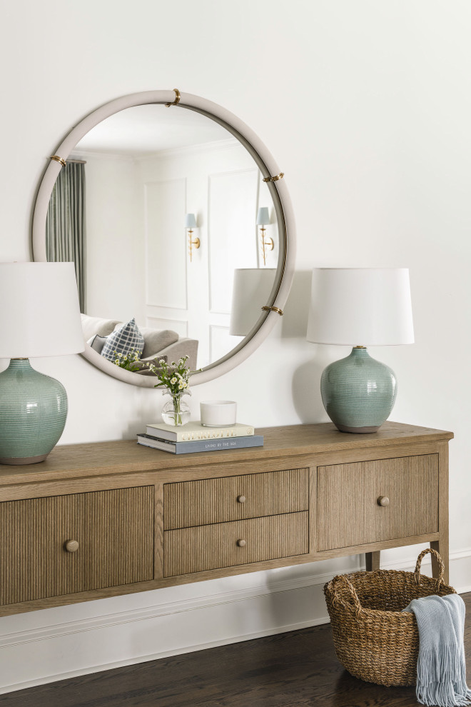Family room - large transitional open concept dark wood floor family room idea with white walls, a standard fireplace and a wall-mounted tv
