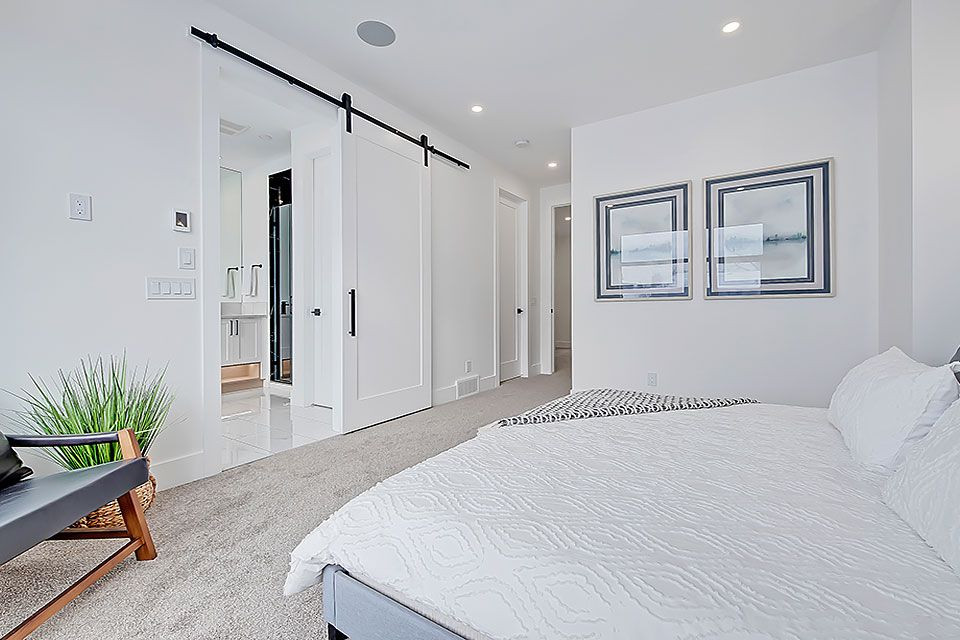 Transitional home design photo in Calgary