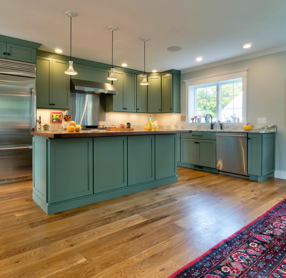 Inspiration for a mid-sized eclectic l-shaped eat-in kitchen in Boston with an undermount sink, shaker cabinets, grey cabinets, wood benchtops, grey splashback, metal splashback, stainless steel appliances, light hardwood floors, with island and brown floor.