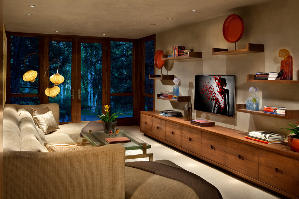 This is an example of a contemporary family room in Denver.