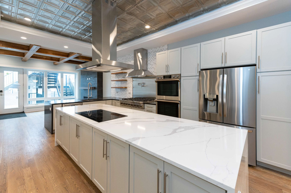 Chicago Luxury Kitchen Remodel with Oversized Waterfall Island