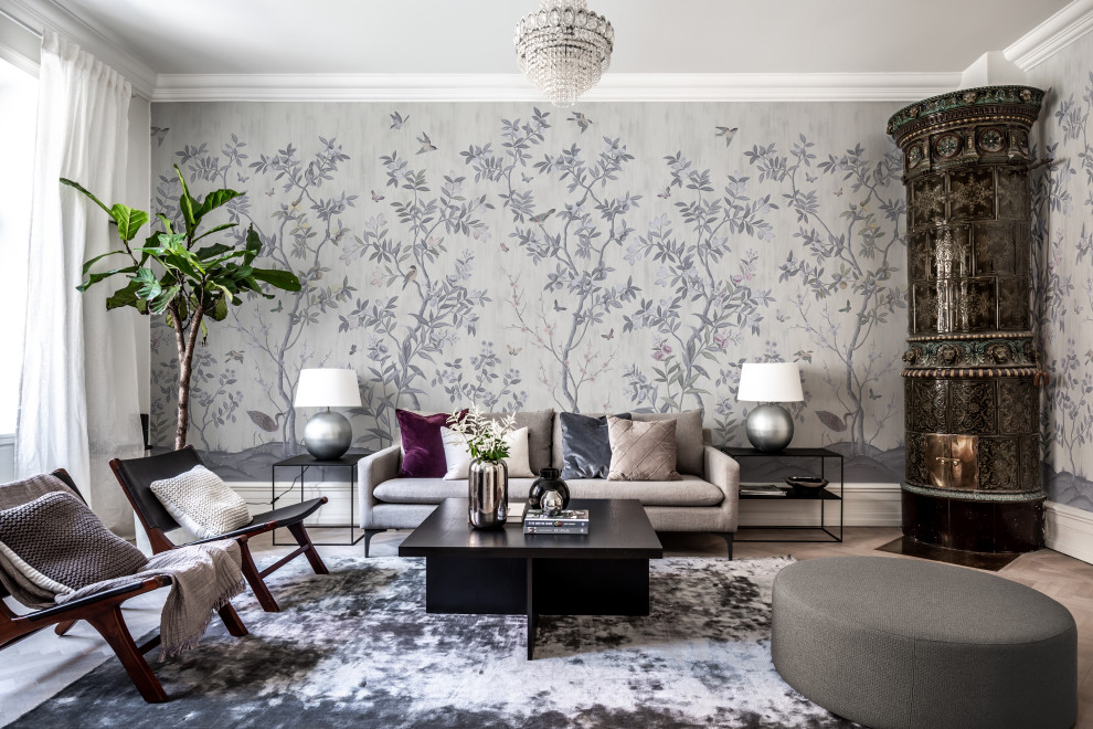 Inspiration for a contemporary living room in Gothenburg with wallpaper.