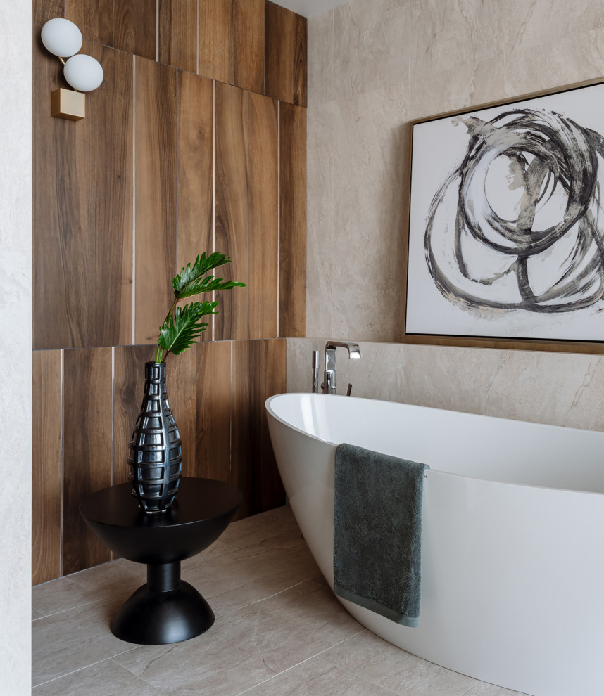 Contemporary master bathroom in Moscow with medium wood cabinets, a freestanding tub, a wall-mount toilet, brown tile, ceramic tile, beige walls, porcelain floors, a vessel sink, solid surface benchtops, white floor and white benchtops.