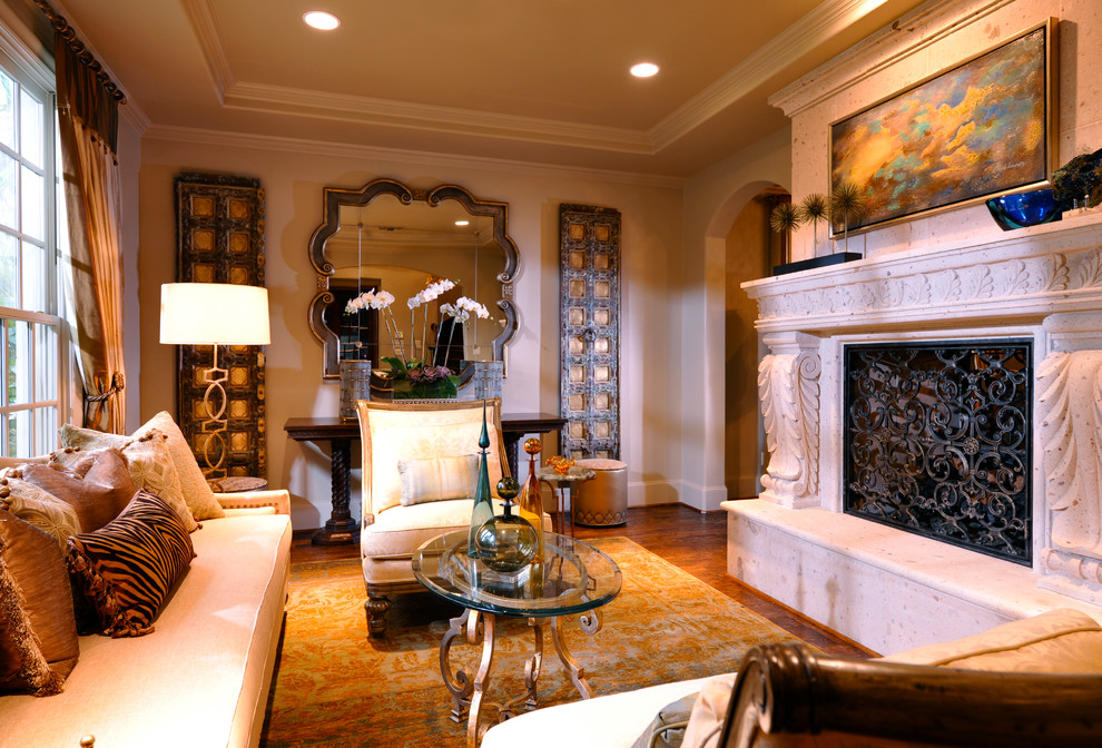 Design ideas for a mid-sized mediterranean enclosed living room in Dallas with beige walls.