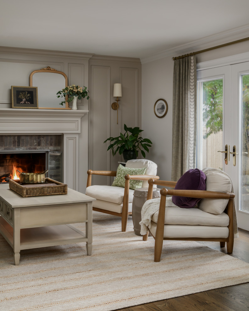 Inspiration for a mid-sized french country open concept dark wood floor and brown floor family room remodel in Philadelphia with beige walls, a standard fireplace and a wood fireplace surround