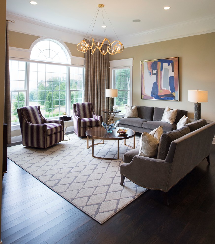 Design ideas for an expansive modern open concept family room in Boston with purple walls, dark hardwood floors, a freestanding tv and brown floor.