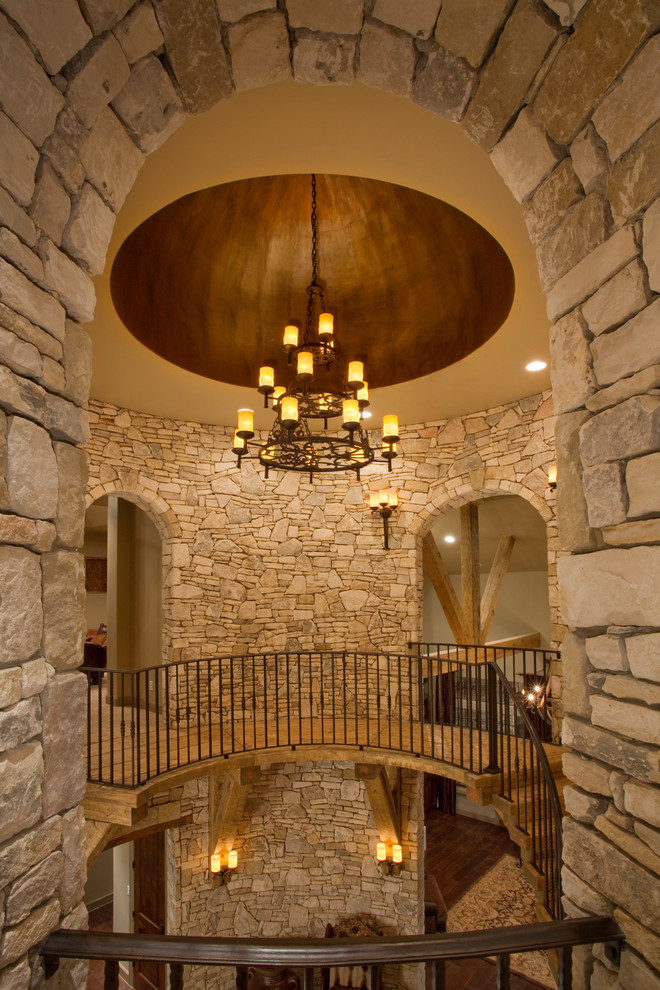 Inspiration for a country wood curved staircase in Dallas with wood risers.