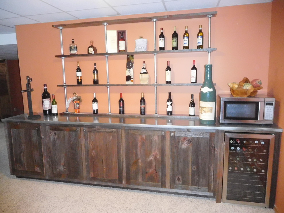 Design ideas for a mid-sized country single-wall home bar in Detroit with distressed cabinets, zinc benchtops and carpet.