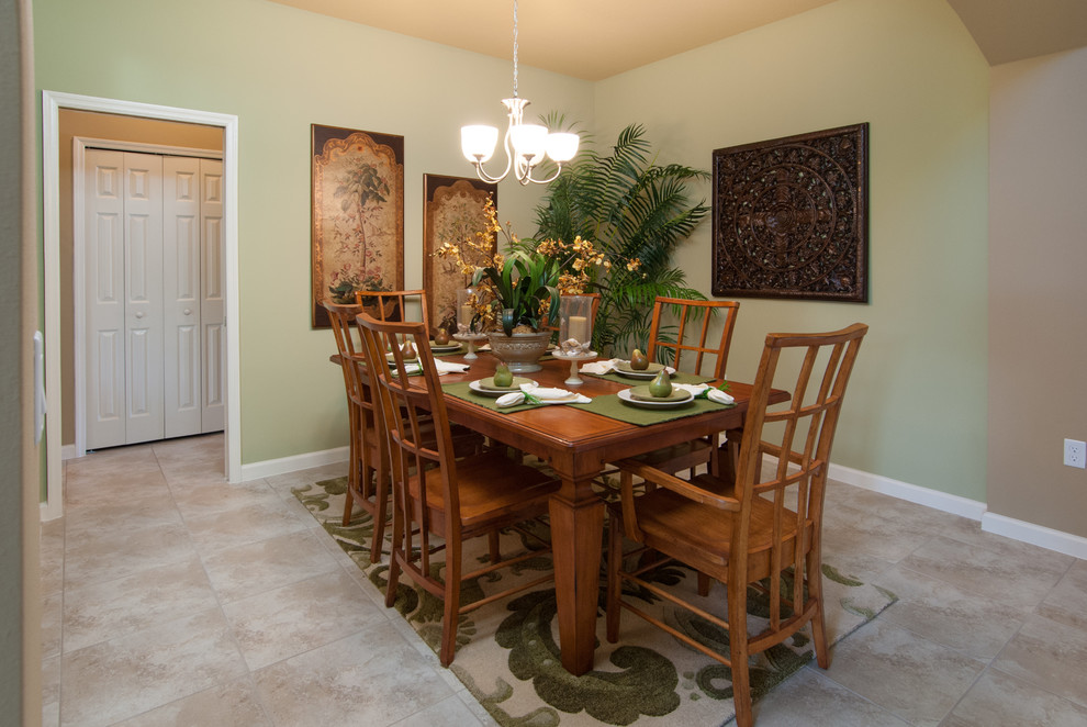 Design ideas for a tropical dining room in Orlando.