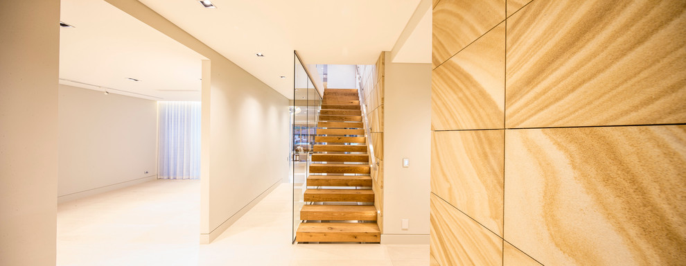 This is an example of a contemporary wood staircase in Sydney.