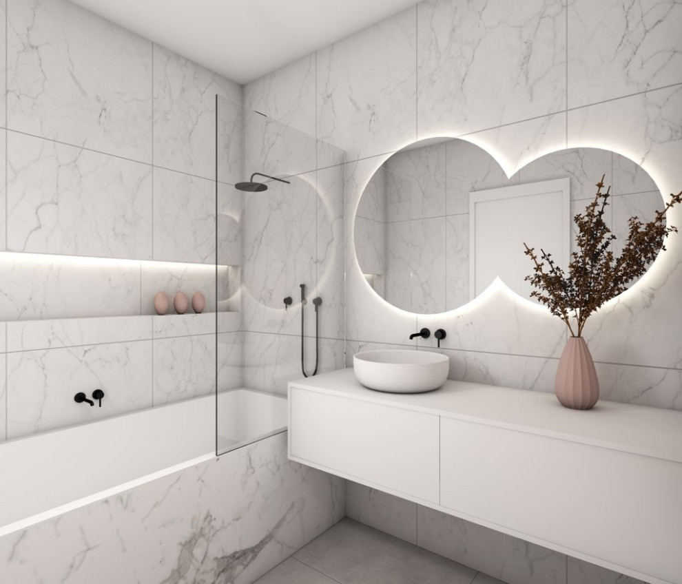 Idéer för ett mellanstort modernt grå badrum, med släta luckor, vita skåp, en vägghängd toalettstol, vit kakel, porslinskakel, vita väggar, klinkergolv i porslin, ett fristående handfat, bänkskiva i akrylsten och grått golv