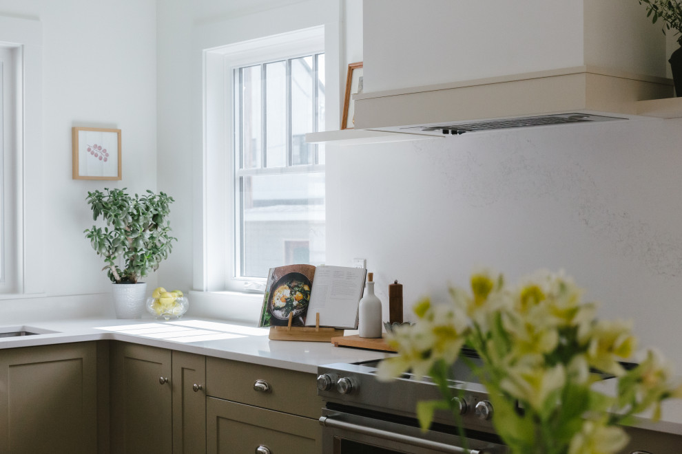 Example of a transitional kitchen design in Vancouver