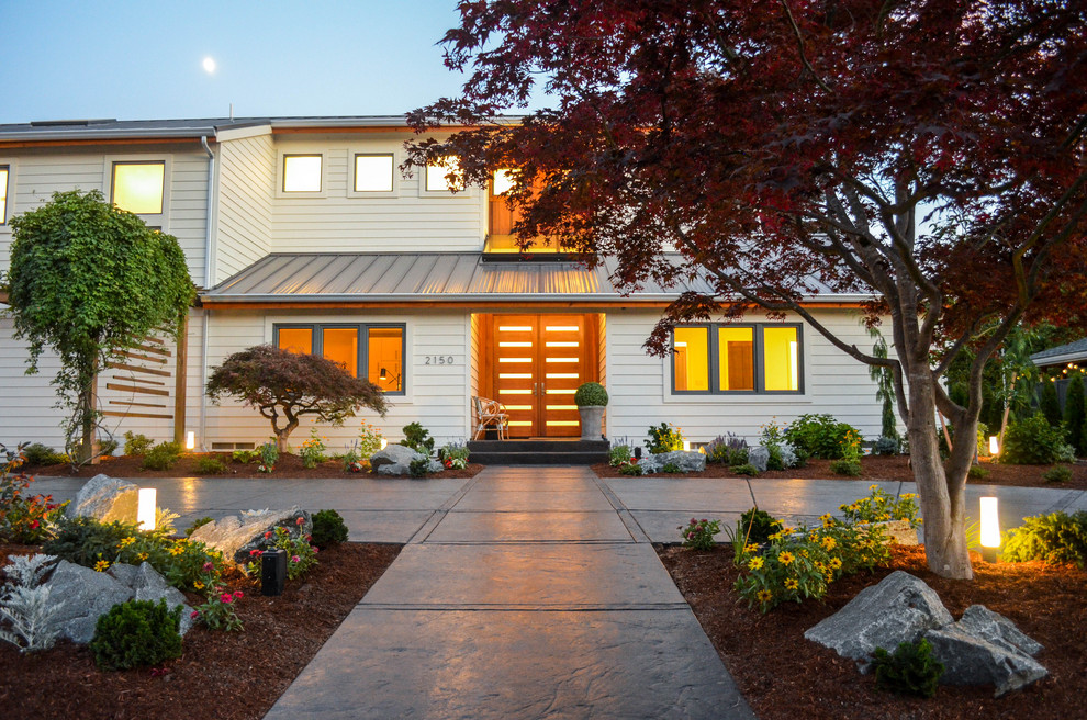 Huge mid-century modern white two-story wood and clapboard gable roof idea in Portland with a metal roof and a gray roof