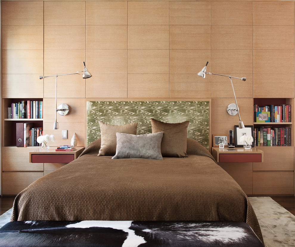 Design ideas for a contemporary bedroom in Chicago with brown walls, dark hardwood floors and brown floor.