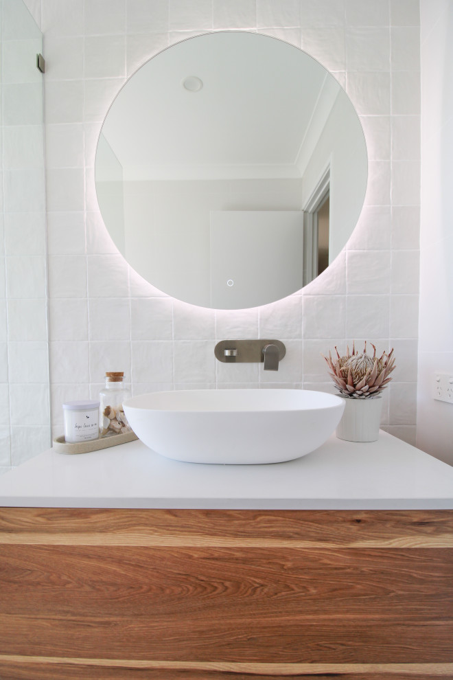 Photo of a modern bathroom in Perth with a built-in bath.