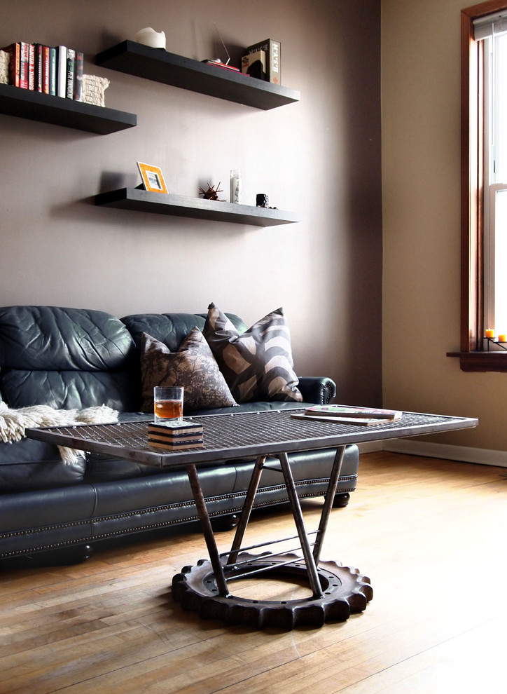Photo of an industrial loft-style living room in Chicago.