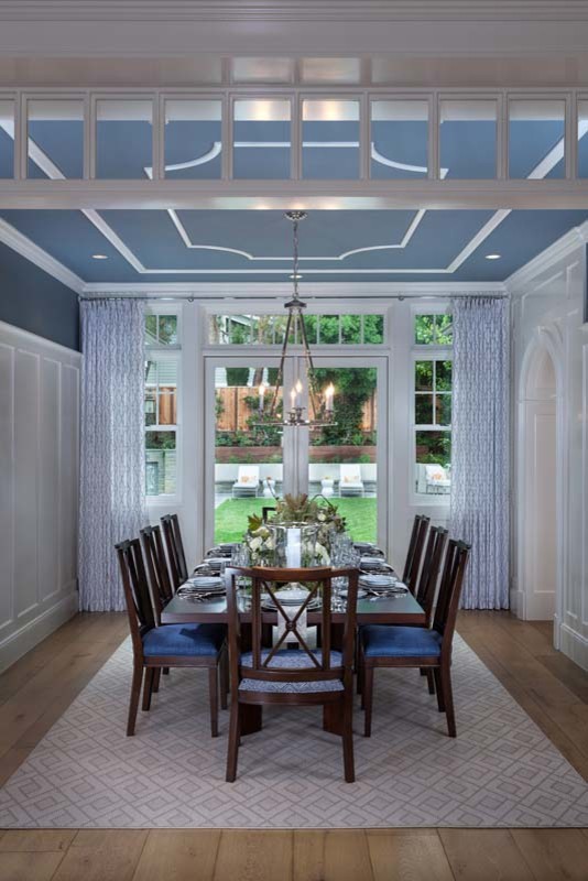 Example of an arts and crafts dining room design in Orange County