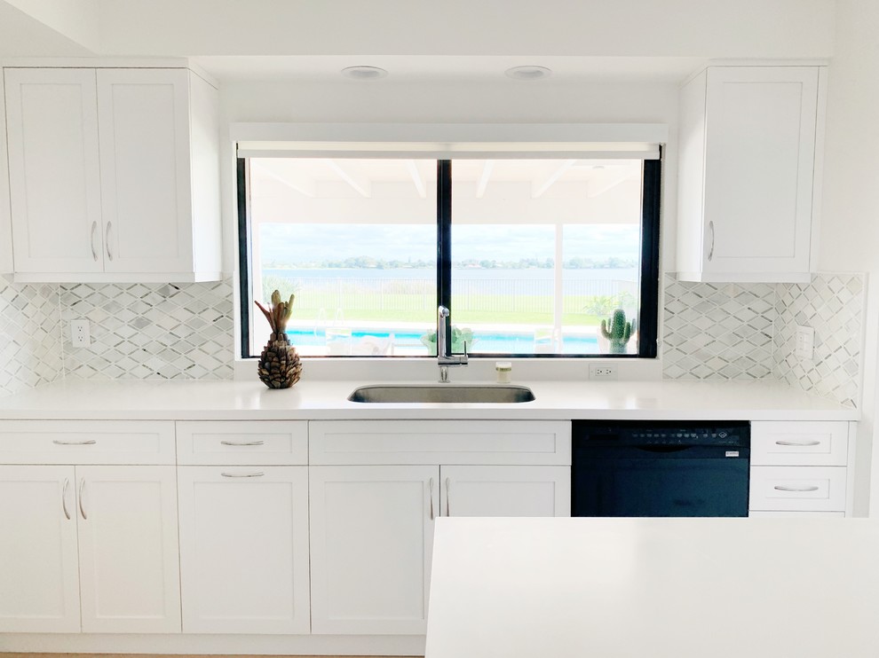 Example of a transitional kitchen design in Miami