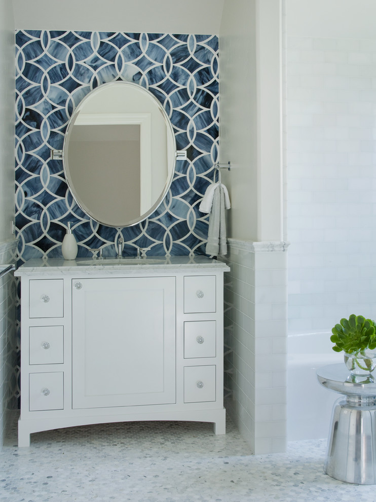 Design ideas for a contemporary powder room in San Francisco with subway tile, mosaic tile floors, white walls, an undermount sink, blue tile, white tile and white benchtops.