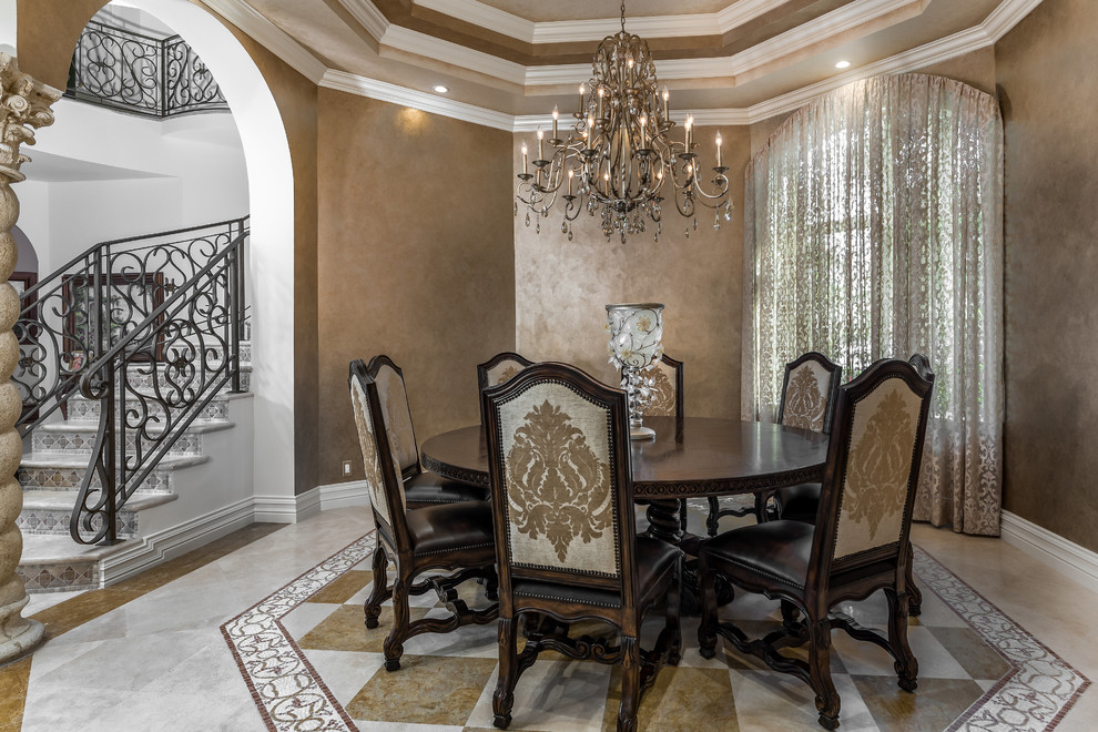 This is an example of a traditional dining room in Other with brown walls and beige floor.