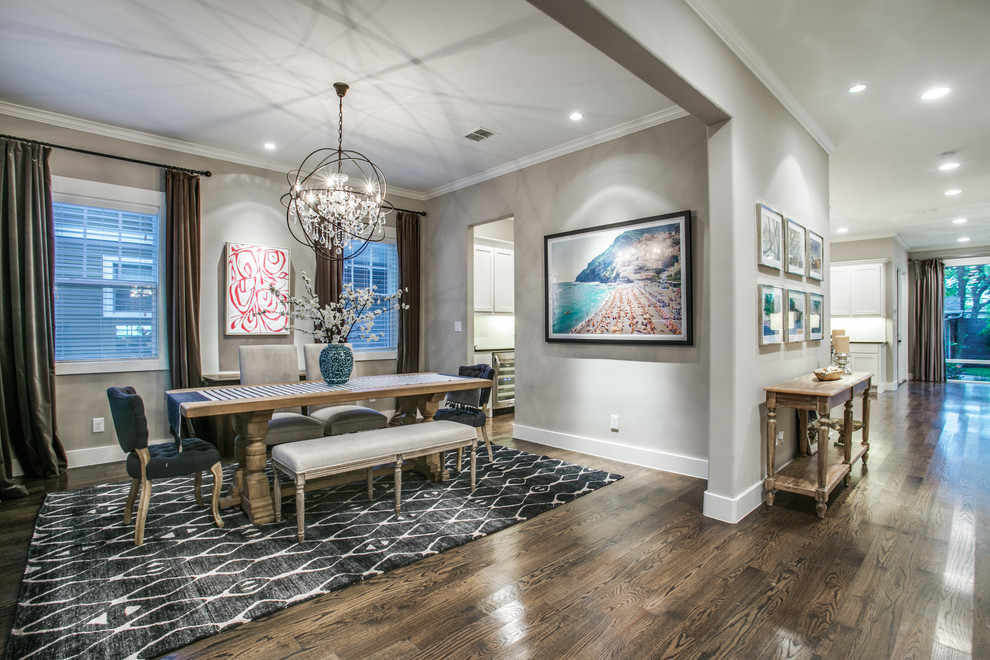 Large contemporary dining room in Dallas with grey walls, painted wood floors and brown floor.