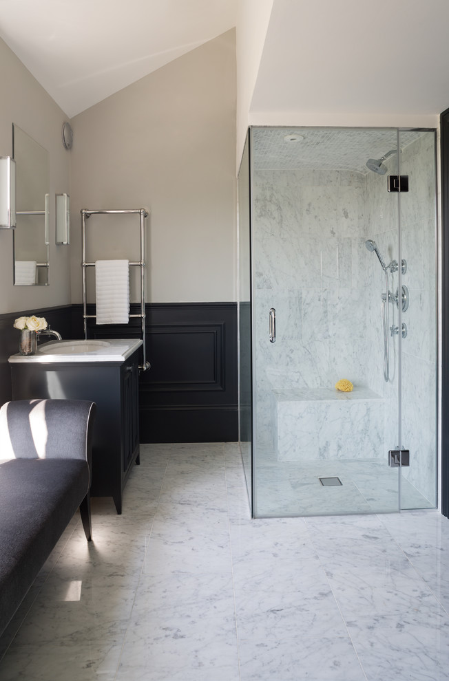 Design ideas for a contemporary bathroom in London with white tile, stone tile, an alcove shower and marble floors.