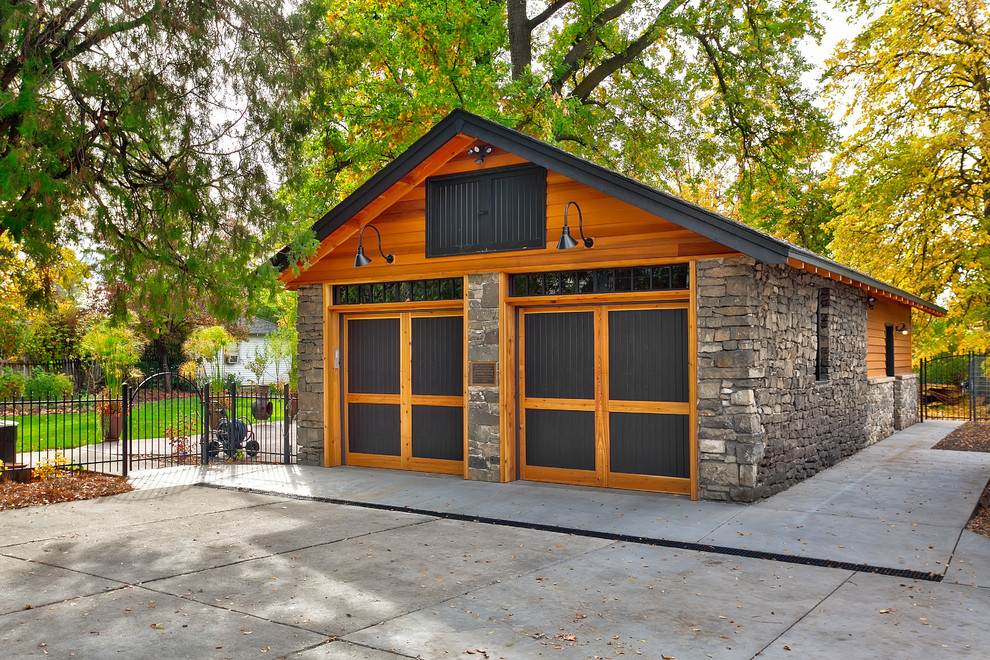 Photo of an arts and crafts two-car garage in Boise.