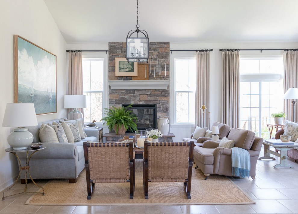 Inspiration for a large transitional open concept family room in New York with white walls and a stone fireplace surround.