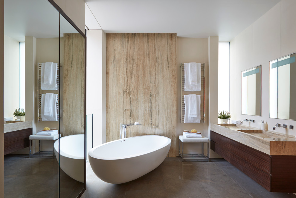 Design ideas for a contemporary bathroom in London with an integrated sink, flat-panel cabinets, medium wood cabinets, marble benchtops, brown tile, stone slab, beige walls and marble floors.