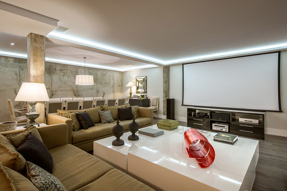 This is an example of a large contemporary open concept living room in Madrid with white walls and medium hardwood floors.