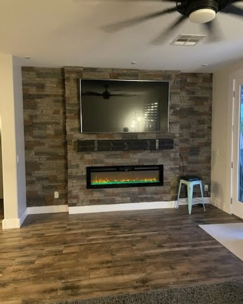 Kenai Stacked Stone Electric Fireplace and TV Accent Wall Living Room