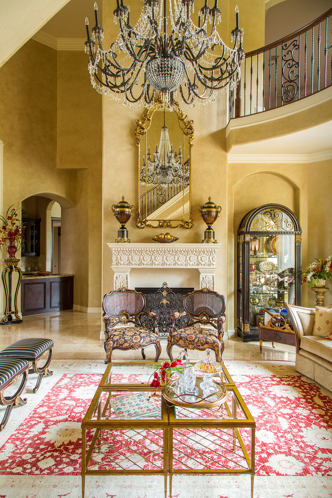 Photo of a mid-sized traditional formal open concept living room in Other with beige walls, marble floors, a standard fireplace, a stone fireplace surround and beige floor.