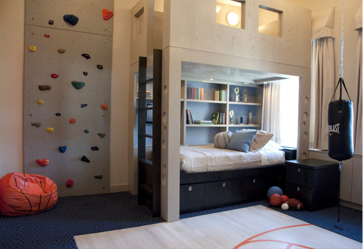 Design ideas for a mid-sized contemporary kids' bedroom for kids 4-10 years old and boys in New York with beige walls, carpet and blue floor.