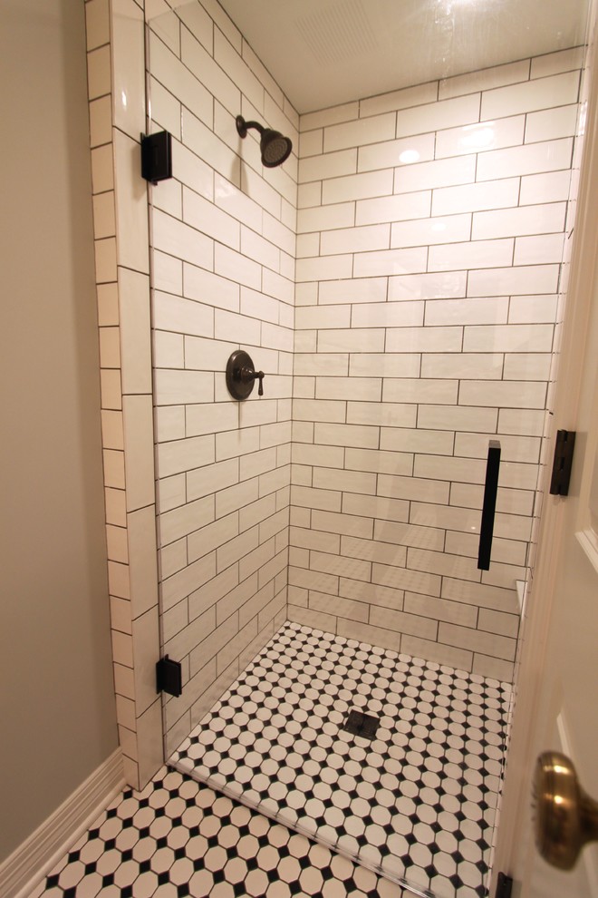 Example of a small transitional 3/4 black and white tile and subway tile ceramic tile home design design in Omaha with red cabinets, gray walls, a drop-in sink and quartz countertops