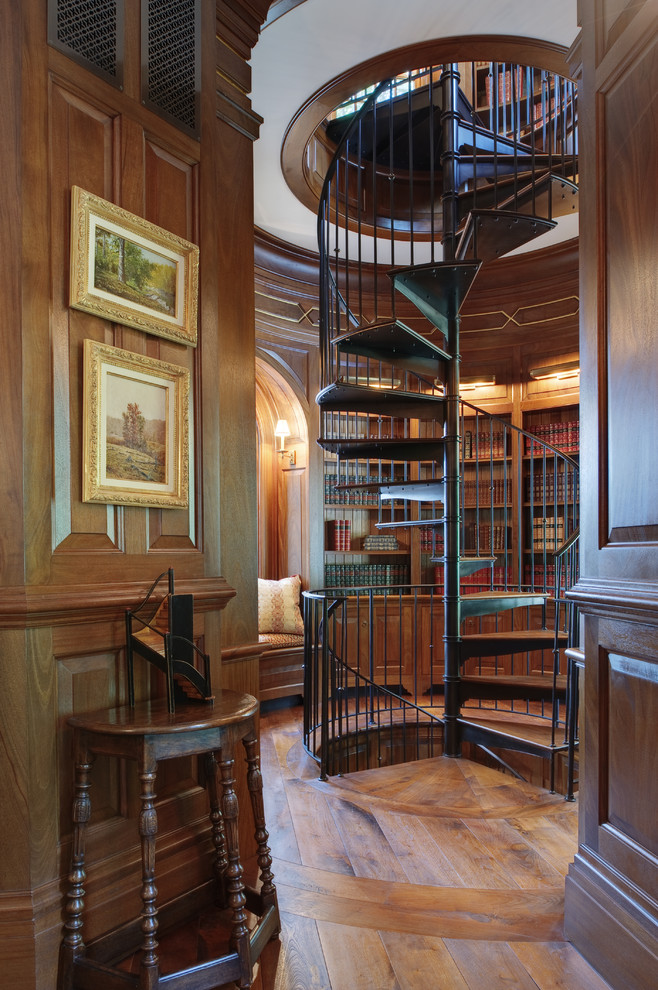 Design ideas for a small traditional wood spiral staircase in New York with open risers.