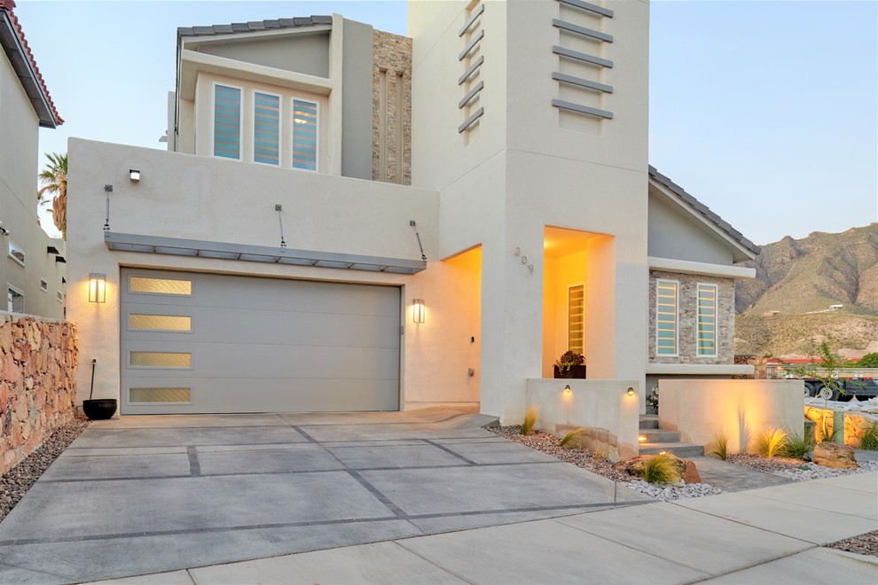 This is an example of a small drought-tolerant front yard concrete paver garden path.