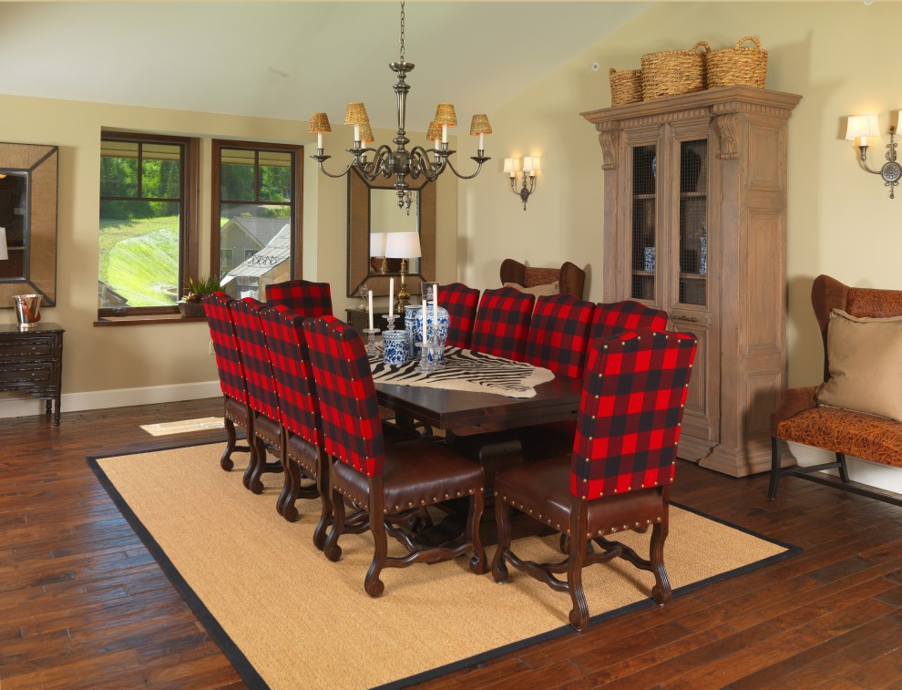 Photo of a traditional dining room in Salt Lake City with beige walls and dark hardwood floors.
