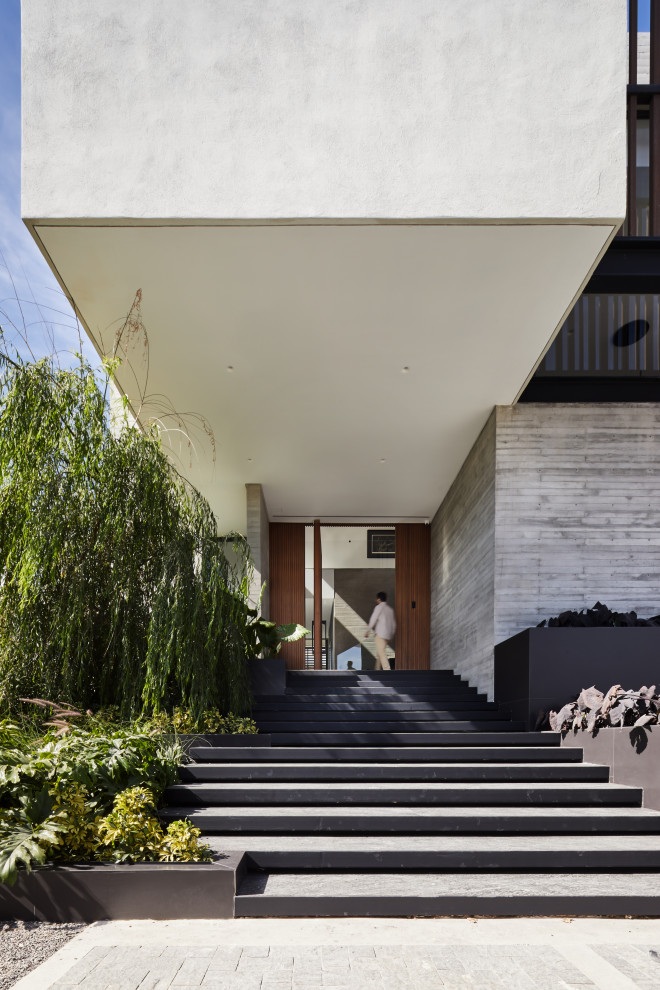 Entryway - large contemporary entryway idea