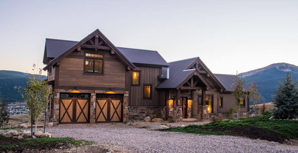 Rustic exterior home idea in Denver