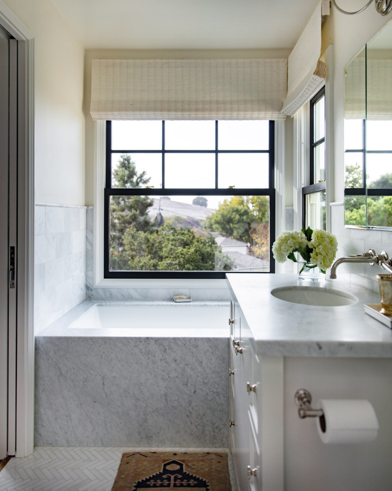 Photo of a small traditional master bathroom in San Francisco with flat-panel cabinets, white cabinets, an undermount tub, an open shower, a two-piece toilet, white tile, marble, white walls, marble floors, an undermount sink, marble benchtops, white floor, an open shower, a single vanity and a freestanding vanity.