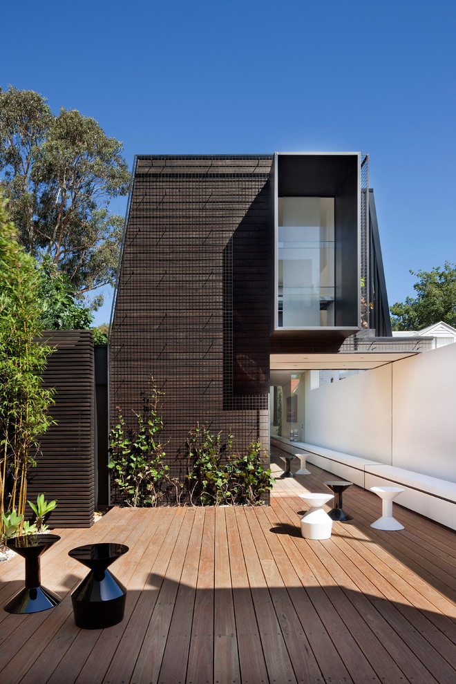 Photo of a mid-sized contemporary two-storey exterior in Melbourne.