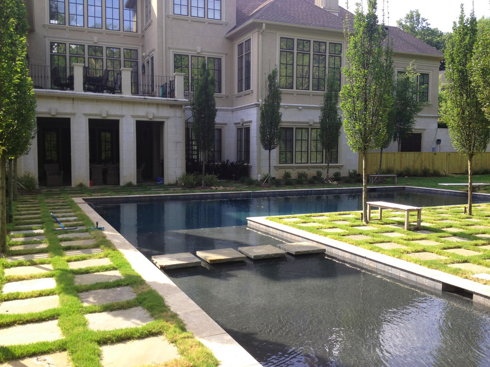 This is an example of a large traditional l-shaped pool in Nashville.