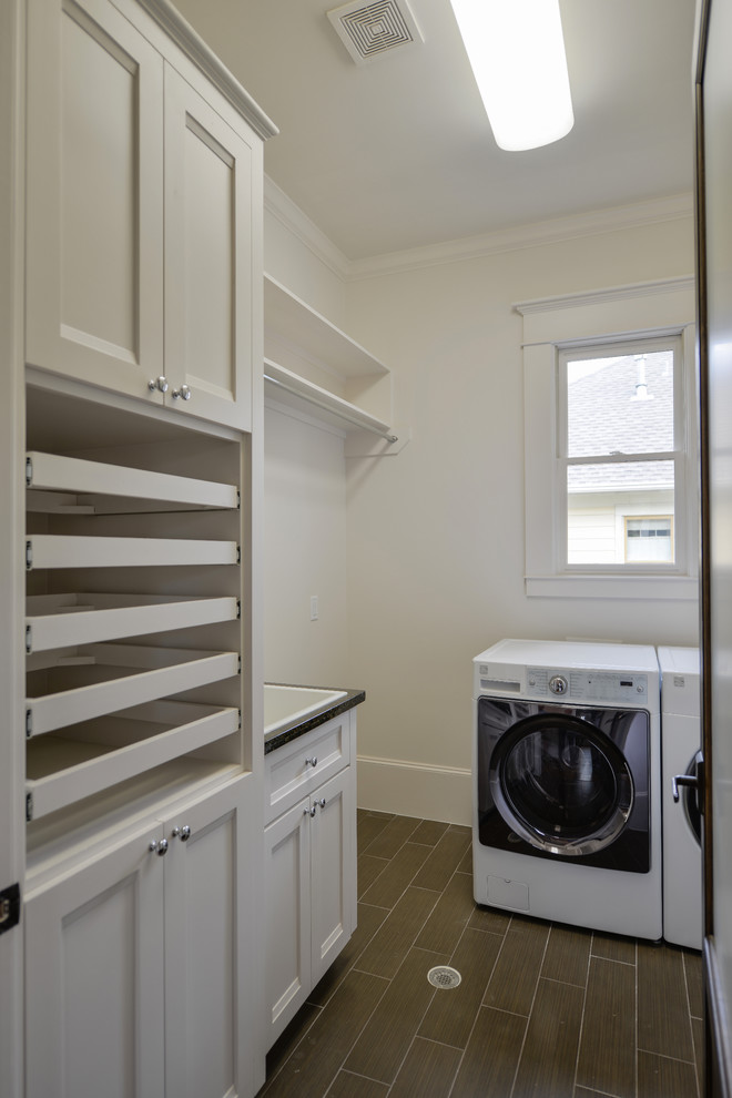 Inspiration for a traditional laundry room in Houston.