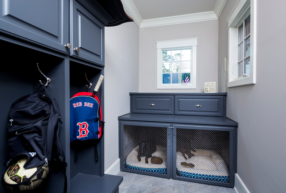 Photo of an expansive traditional foyer in Charlotte with grey walls, a double front door and a dark wood front door.