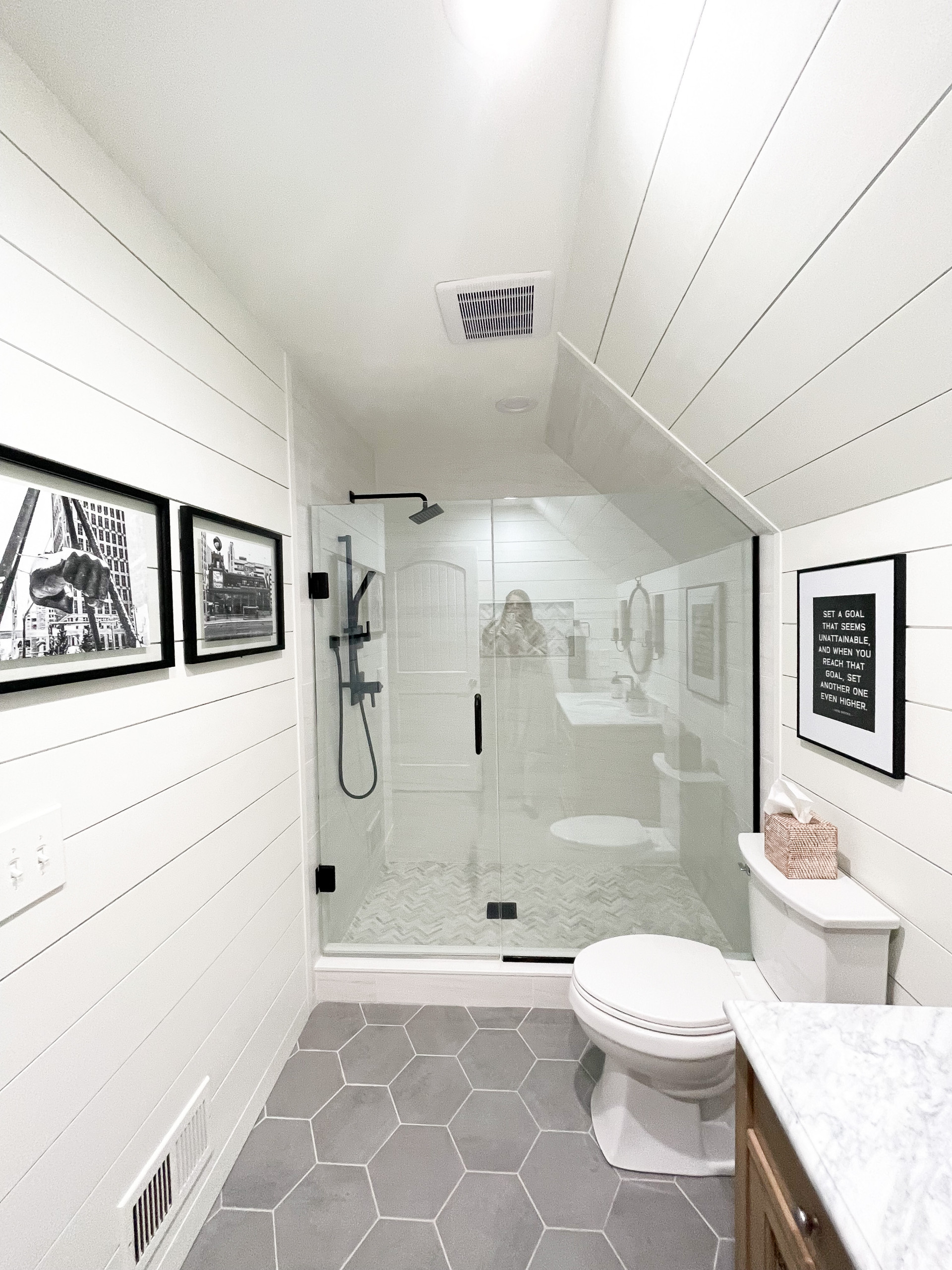 Marble and Brass Sink vanity on Black Vertical Shiplap Wall - Transitional  - Bathroom