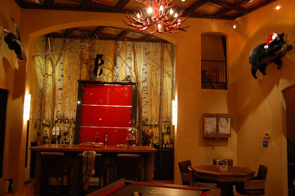 Transitional home design photo in Albuquerque