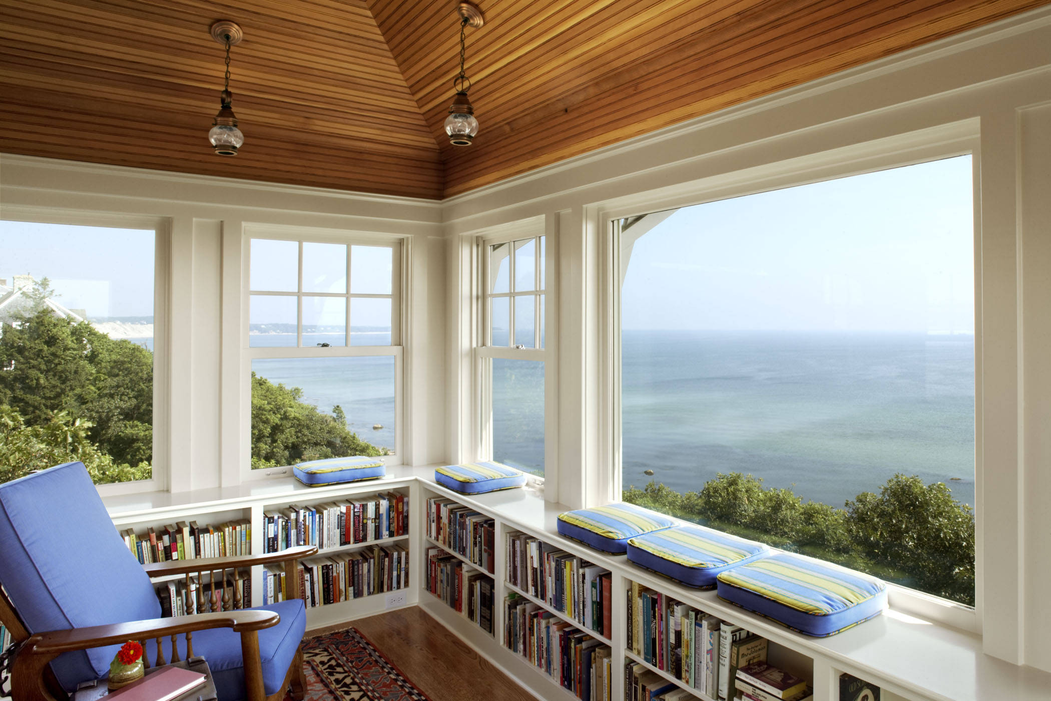 Low bookshelf shop under window