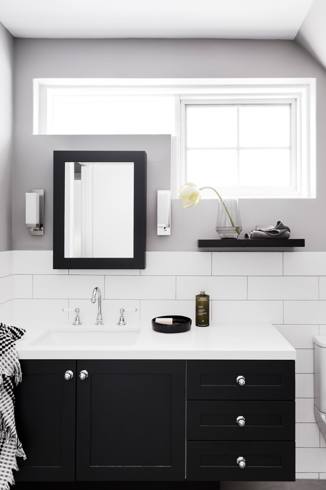 Inspiration for a mid-sized contemporary master bathroom in Melbourne with shaker cabinets, black cabinets, a double shower, a one-piece toilet, gray tile, porcelain tile, grey walls, porcelain floors, an undermount sink, engineered quartz benchtops, grey floor and a hinged shower door.