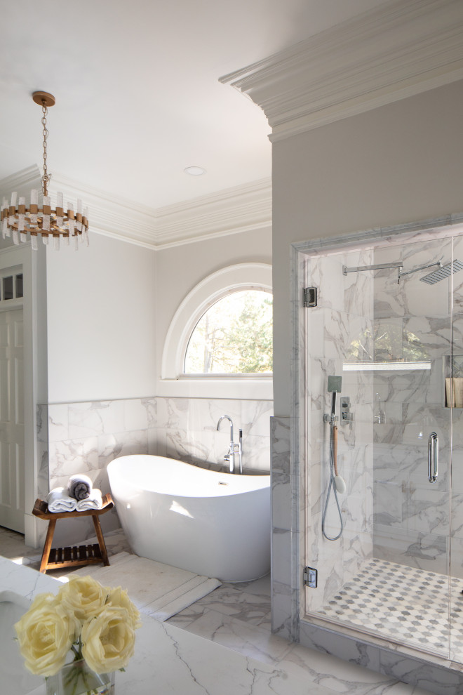 Large transitional master white tile and marble tile ceramic tile, white floor and double-sink freestanding bathtub photo in Atlanta with raised-panel cabinets, white cabinets, a two-piece toilet, gray walls, an undermount sink, quartz countertops, a hinged shower door, white countertops and a built-in vanity