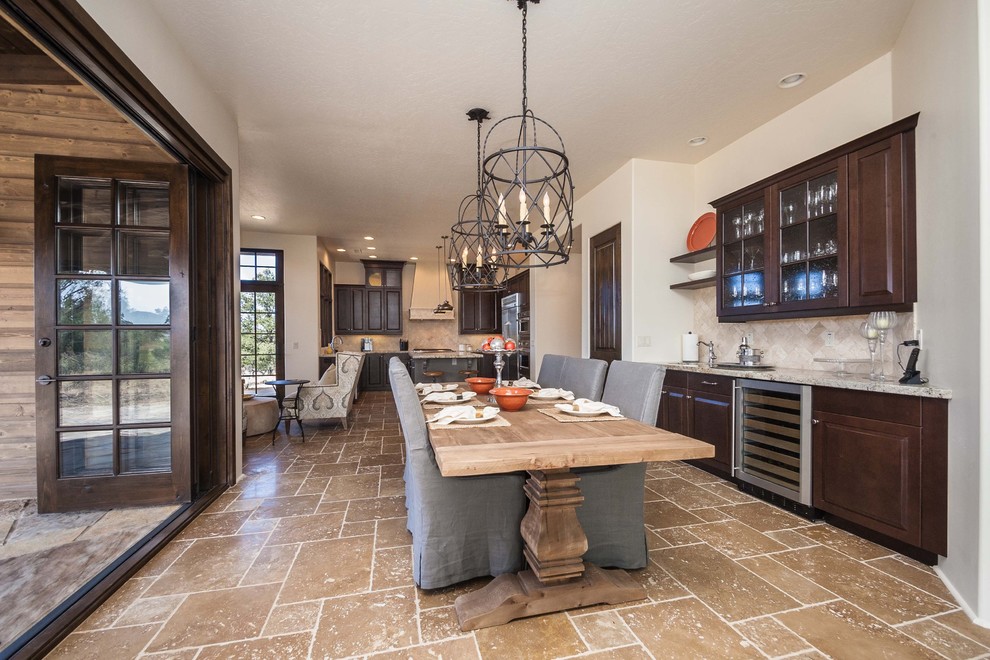 This is an example of a traditional kitchen/dining combo in Phoenix with beige walls.